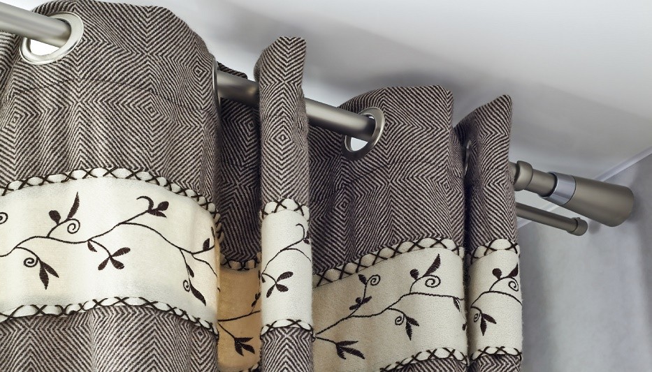 heavy woolen curtains with ring-top rail